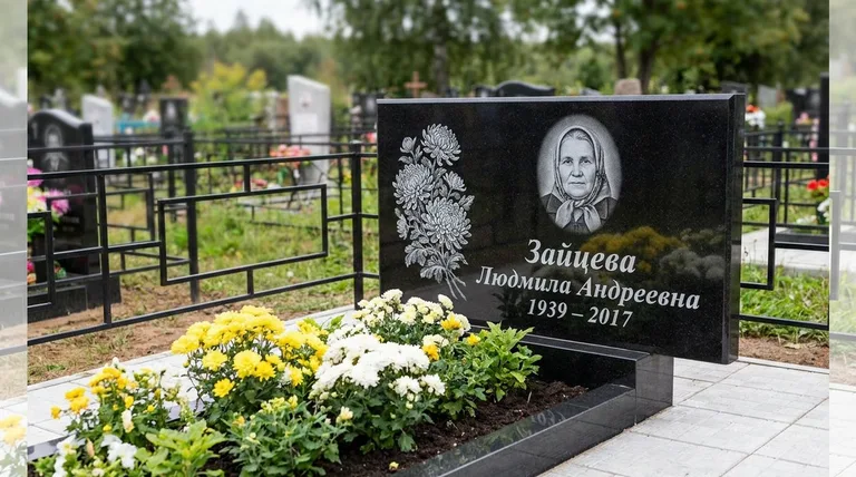 Памятник с гравировкой хризантем — выполненная работа «Зайцева» в Екатеринбурге