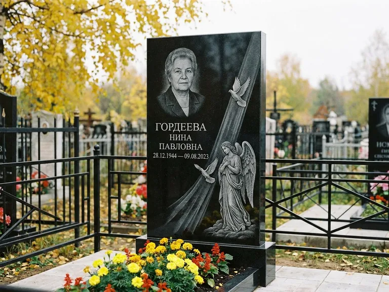 Памятник с гравировкой ангела — гравировка ангела с голубем по диагонали стелы, работа «Гордеева» в Екатеринбурге