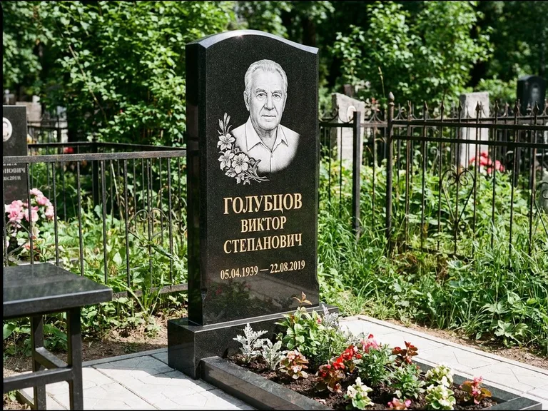 Гравировка портрета на чёрном граните — выполненная работа 13 в Екатеринбурге