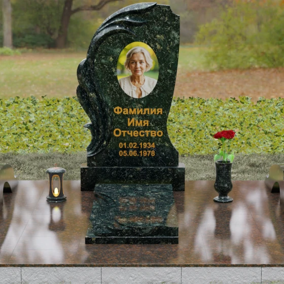 Гранитный памятник с барельефом крыла и птицы, гранит Балтик грин, вид 2